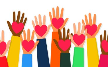 Charity, volunteering and donating concept. Raised up human hands with red hearts. Children's hands are holding heart symbols. Vector